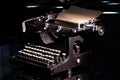 Vintage mechanical typewriter on black background concept photography closeup view Royalty Free Stock Photo