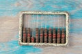 Vintage metal abacus on wooden background Royalty Free Stock Photo