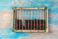 Vintage metal abacus on wooden background Royalty Free Stock Photo