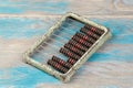 Vintage metal abacus on wooden background Royalty Free Stock Photo