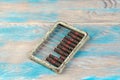 Vintage metal abacus on wooden background Royalty Free Stock Photo