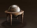 Vintage metal globe on wooden table Royalty Free Stock Photo