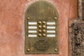 Vintage metal intercom on an old brown painted wall Royalty Free Stock Photo