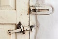 Vintage metal lock on white painted door Royalty Free Stock Photo