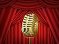 Vintage metal microphone. Red silk curtain backdrop. Retro mic on empty theatre stage. Royalty Free Stock Photo