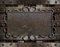 Vintage metal plate on old oak door
