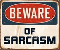 Vintage Rusty Beware of Sarcasm Metal Sign. Royalty Free Stock Photo