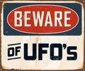 Vintage Rusty Beware of UFO's Metal Sign.