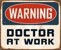 Vintage Rusty Warning Doctor at Work Metal Sign. Royalty Free Stock Photo