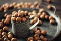 Vintage metallic dark grey mug and tray with hazelnuts