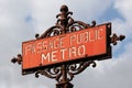 Vintage metro sign in Paris at subway station entrance Royalty Free Stock Photo