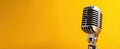 The vintage microphone against a bright yellow background showcasing creativity and sound..AI generated image Royalty Free Stock Photo
