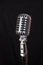 Vintage microphone, black background Royalty Free Stock Photo