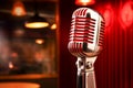 Vintage microphone on blurred night club background. Invitation to a stand-up evening, concert or open mic show. Copy Royalty Free Stock Photo