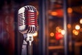 Vintage microphone on blurred night club background. Invitation to a stand-up evening, concert or open mic show. Copy Royalty Free Stock Photo