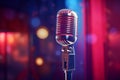 Vintage microphone on blurred night club background. Invitation to a stand-up evening, concert or open mic show. Copy Royalty Free Stock Photo