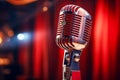 Vintage microphone on blurred night club background. Invitation to a stand-up evening, concert or open mic show. Copy Royalty Free Stock Photo