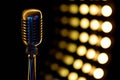 Vintage microphone with color background in nightclub