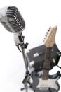 Vintage microphone, electric guitar and amp Royalty Free Stock Photo