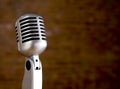 Vintage Microphone in front of blurred background Royalty Free Stock Photo