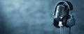 The vintage microphone with headphones in a serene blue atmosphere..AI generated image Royalty Free Stock Photo