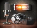 Vintage microphone and headphones with signboard on air. Broadc Royalty Free Stock Photo