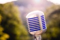 Vintage microphone, metallic retro style. Outdoor live show concept