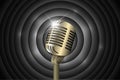 Vintage microphone on movie ending screen retro black and white circles signboard backdrop. Mic on empty theatre stage