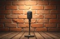 Vintage microphone on stage brick wall background ready for karaoke performance. Retro microphone, performance show. Empty stage, Royalty Free Stock Photo