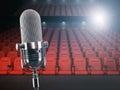 Vintage microphone on the stage of concert hall or theater with Royalty Free Stock Photo