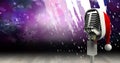 Vintage microphone on a stand over purple snowflakes background, performance and holiday concepts Royalty Free Stock Photo