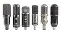 vintage microphones aligned in a row studio equipment on transparent background Royalty Free Stock Photo