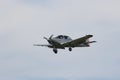 Vintage Military Airplane Approaches Landing