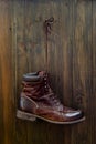 Vintage military boot on wooden background