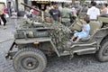 Vintage military jeep driven by a child. Royalty Free Stock Photo