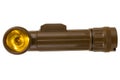 vintage military style flashlight with yellow light isolated on white Royalty Free Stock Photo
