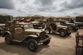 vintage military vehicle collection, featuring tanks, jeeps and other vehicles in their original livery