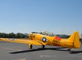 Vintage military war plane on runway at airshow. Royalty Free Stock Photo