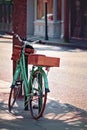 A vintage mint green bike parked in downtown Charleston, South Carolina.