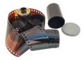 Vintage 35mm film with film canister and lid Royalty Free Stock Photo