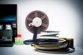 A vintage 8mm movie editing desktop with reels and elements in o Royalty Free Stock Photo