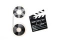 Vintage 8mm movie reels and clapper board white background Royalty Free Stock Photo