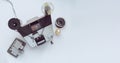 Vintage 8mm moviola with cutter, 8mm reel and glue. Royalty Free Stock Photo