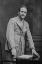 Old monochrome studio photograph of young Caucasian man, dating to the 1920s, Edwardian era.