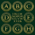 Vintage monogram kit. Golden letters and floral round frames for creating initial logo in antique style Royalty Free Stock Photo