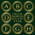 Vintage monogram kit. Golden letters and floral round frames Royalty Free Stock Photo