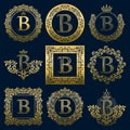 Vintage monograms set of B letter. Golden heraldic logos in wreaths, round and square frames Royalty Free Stock Photo