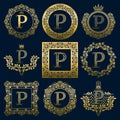 Vintage monograms set of P letter. Golden heraldic logos in wreaths, round and square frames Royalty Free Stock Photo