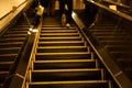 Vintage Motion Blurred man hurry walking up escalator during the rush hours in metropolitan subway shopping mall urban area