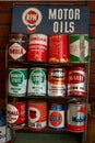 Vintage motor oil cans on display